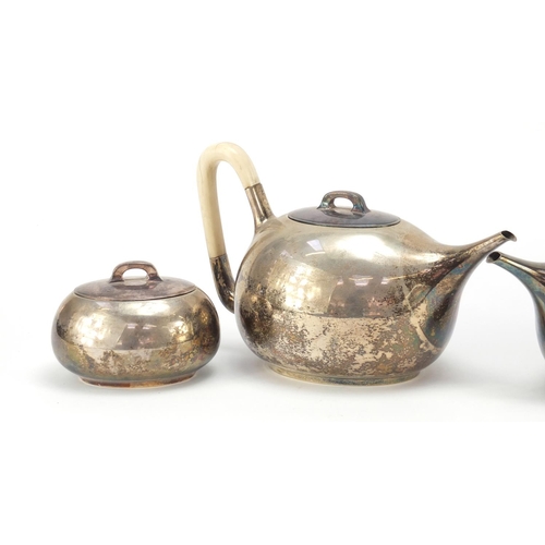 413 - Italian 800 grade silver Modernist tea set with ivory handles, comprising teapot, coffee pot, milk j... 