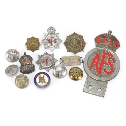 601 - Fire Brigade memorabilia including badges, buttons and a Auxiliary Fire Service car badge