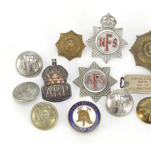 601 - Fire Brigade memorabilia including badges, buttons and a Auxiliary Fire Service car badge