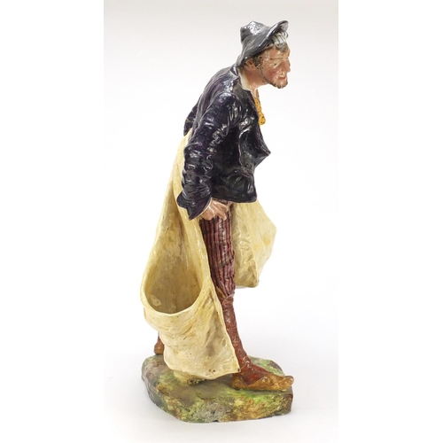 468 - Large Italian pottery figure of a fisherman by Cacciapouti, 60cm high