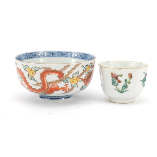 448 - Two Chinese porcelain bowls including one hand painted with a dragon and phoenix chasing a flaming p... 