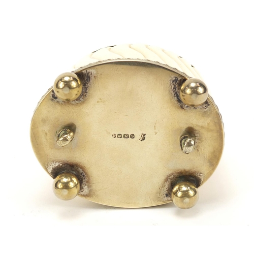 504 - 19th century carved ivory tea caddy with silver plated mounts on ball feet, 11cm high