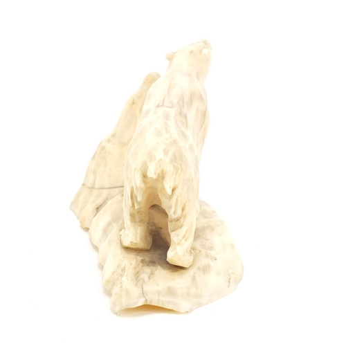 501 - Early 19th century marine ivory carving of a polar bear, 14cm wide