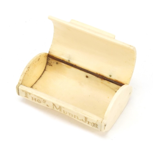 297 - Early 19th century bone snuff box carved with a town, inscribed Thos Munn Jnr, 8cm wide