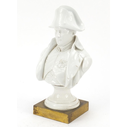 467 - 19th century Naples porcelain bust of Napoleon raised on a square gilt brass plinth base, 26.5cm hig... 