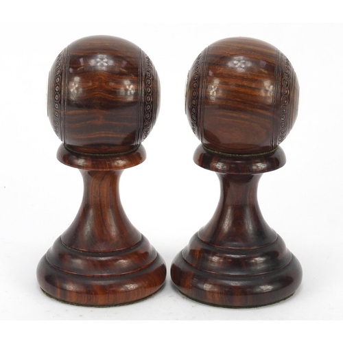 192 - Two lignum vitae presentation bowls on stands by Taylor-Rolph of London, each with inset silver plaq... 