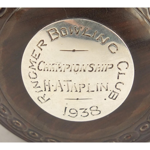 192 - Two lignum vitae presentation bowls on stands by Taylor-Rolph of London, each with inset silver plaq... 