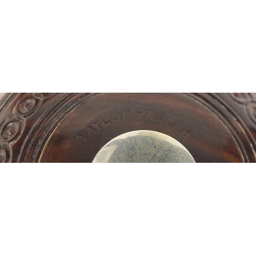 192 - Two lignum vitae presentation bowls on stands by Taylor-Rolph of London, each with inset silver plaq... 