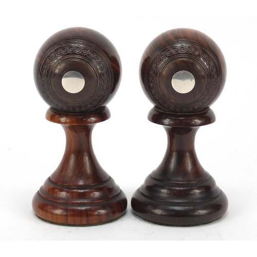 192 - Two lignum vitae presentation bowls on stands by Taylor-Rolph of London, each with inset silver plaq... 