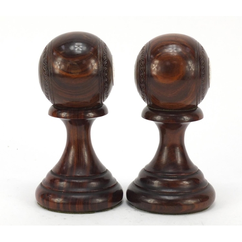 192 - Two lignum vitae presentation bowls on stands by Taylor-Rolph of London, each with inset silver plaq... 