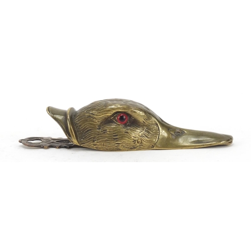 196 - Victorian engraved brass letter clip in the form of a ducks head with beaded glass eyes, 15.5cm in l... 