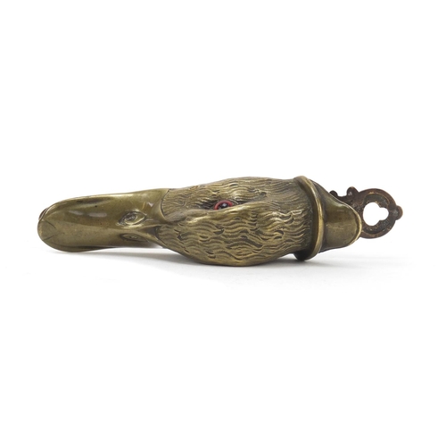 196 - Victorian engraved brass letter clip in the form of a ducks head with beaded glass eyes, 15.5cm in l... 