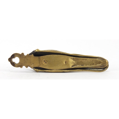 196 - Victorian engraved brass letter clip in the form of a ducks head with beaded glass eyes, 15.5cm in l... 