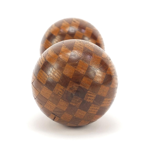 499 - Large inlaid treen double darning ball, 20cm in length