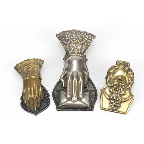 197 - Three 19th century letter clips including two in the form of a hand, the largest 14.5cm in length