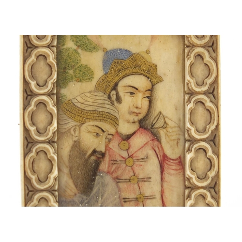 249 - 18th century Persian watercolour portrait miniature onto ivory of two noble people, housed in a carv... 