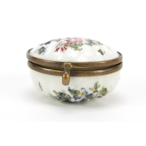 500 - 19th century porcelain patch box hand painted with flowers, factory marks to the reverse, 4.5cm wide