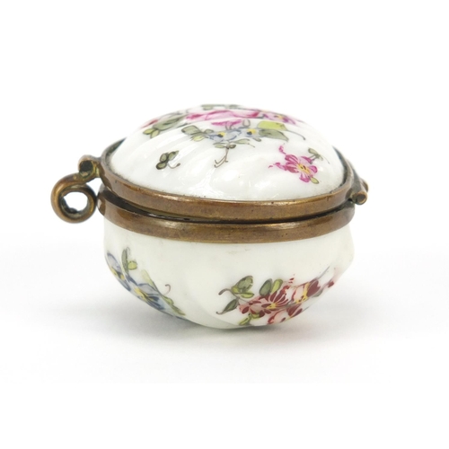 500 - 19th century porcelain patch box hand painted with flowers, factory marks to the reverse, 4.5cm wide