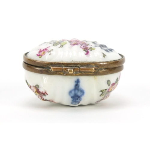 500 - 19th century porcelain patch box hand painted with flowers, factory marks to the reverse, 4.5cm wide