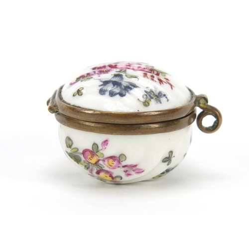 500 - 19th century porcelain patch box hand painted with flowers, factory marks to the reverse, 4.5cm wide