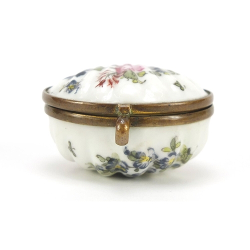 500 - 19th century porcelain patch box hand painted with flowers, factory marks to the reverse, 4.5cm wide