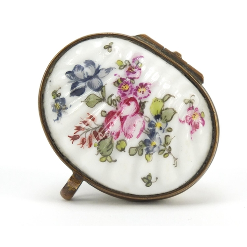 500 - 19th century porcelain patch box hand painted with flowers, factory marks to the reverse, 4.5cm wide