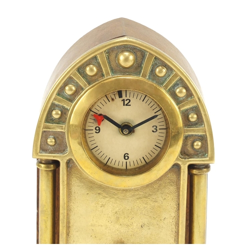 130 - Oak and brass Secessionist mantle clock with columns and Arabic numerals, 23cm high