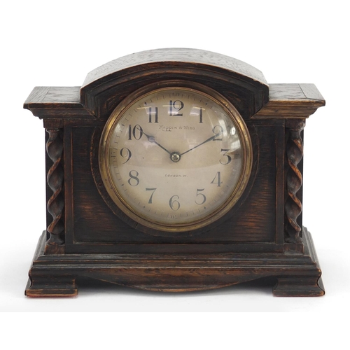 614 - Mappin & Webb oak cased mantle clock with silvered dial having Arabic numerals, 15.5cm high