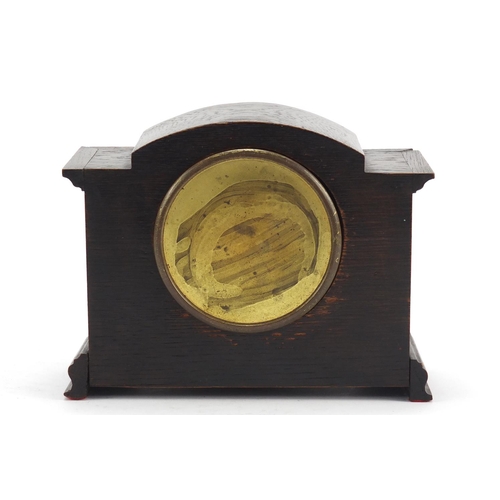 614 - Mappin & Webb oak cased mantle clock with silvered dial having Arabic numerals, 15.5cm high