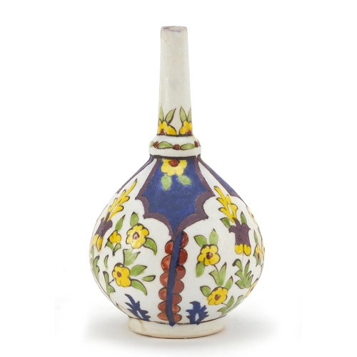 246 - Early Islamic pottery rosewater gulaptan hand painted with flowers, 15.5cm high