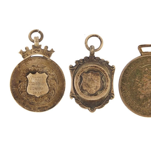 1539 - Three sports jewels and a commemorative medallion including two silver