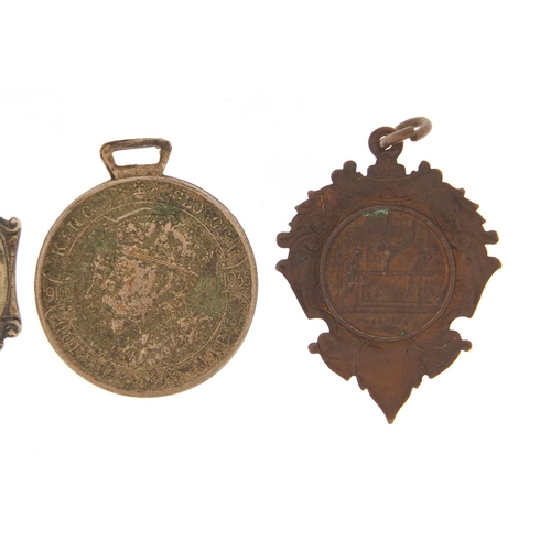 1539 - Three sports jewels and a commemorative medallion including two silver