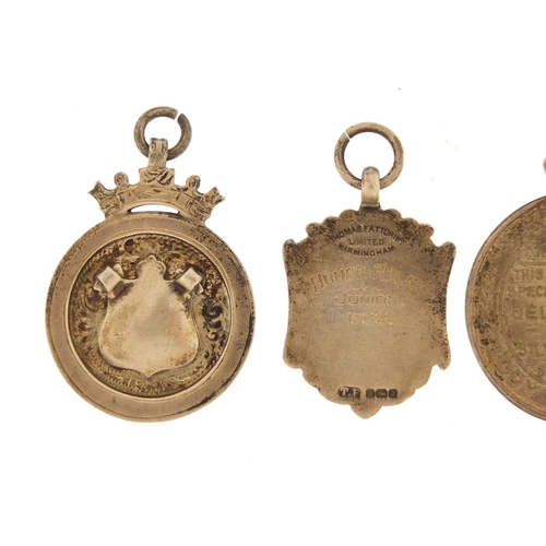 1539 - Three sports jewels and a commemorative medallion including two silver