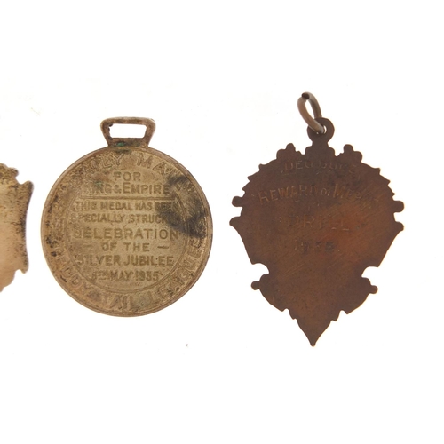 1539 - Three sports jewels and a commemorative medallion including two silver