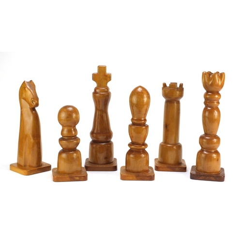 901 - Six oversized carved wood chess pieces, the largest 38cm high