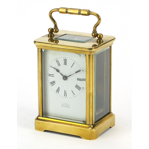 344 - Brass cased carriage clock by Sly & Co of Barnstaple, with key and leather travelling case, inscribe... 