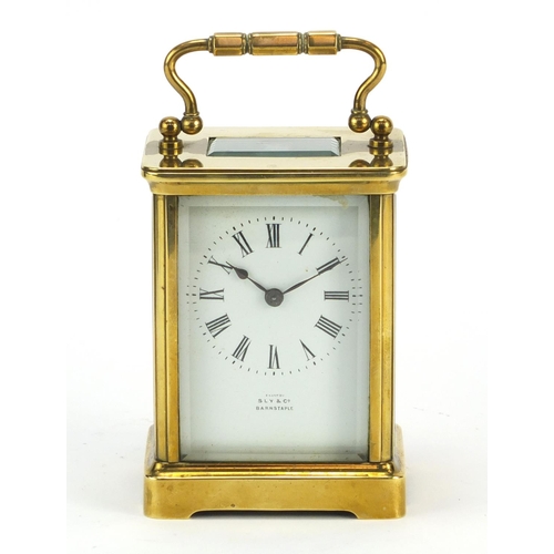 344 - Brass cased carriage clock by Sly & Co of Barnstaple, with key and leather travelling case, inscribe... 