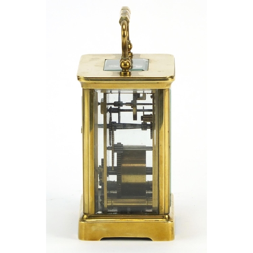 344 - Brass cased carriage clock by Sly & Co of Barnstaple, with key and leather travelling case, inscribe... 