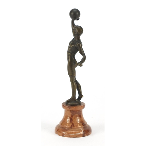 194 - Patinated bronze figure of an Art Deco athlete raised on a circular marble base, 20cm high