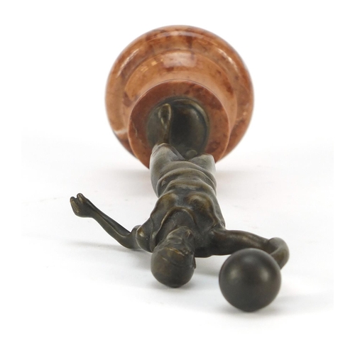 194 - Patinated bronze figure of an Art Deco athlete raised on a circular marble base, 20cm high