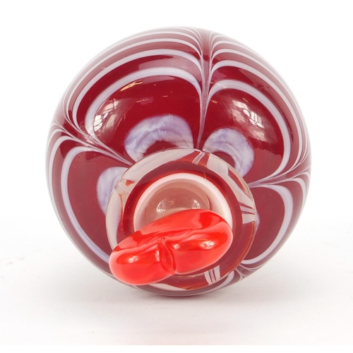 383 - Red cased Art Glass scent bottle with heart design stopper and combed design, 12cm high