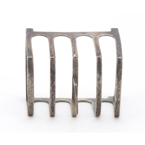 509 - George VI silver four slice toast rack by Walker & Hall, Sheffield 1939, 7.5cm wide, 74.2g