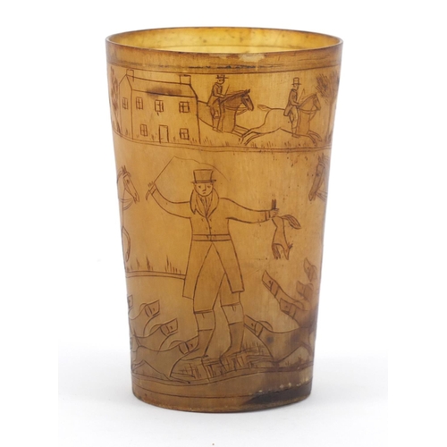 117 - 18th century horn beaker carved with a continuous hunting scene, 11cm high