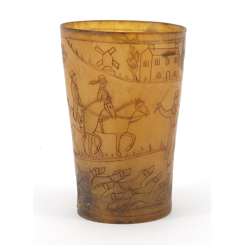 117 - 18th century horn beaker carved with a continuous hunting scene, 11cm high