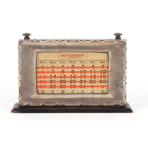 84 - George V rectangular silver mounted and ebonised perpetual desk calendar by WJ Myatt & Co, Birmingha... 