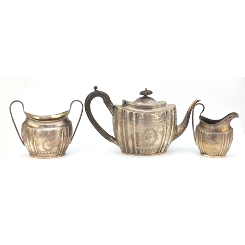 22 - Edward VII silver three piece tea set by George Nathan and Ridley Hayes, Chester 1910, the teapot 16... 