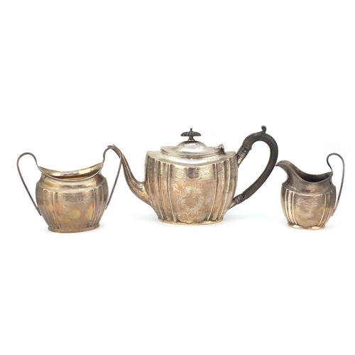 22 - Edward VII silver three piece tea set by George Nathan and Ridley Hayes, Chester 1910, the teapot 16... 