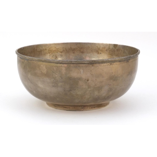 82 - Large circular silver bowl, possibly Australian, impressed ST Silver to the base, 23cm in diameter, ... 