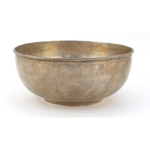 82 - Large circular silver bowl, possibly Australian, impressed ST Silver to the base, 23cm in diameter, ... 