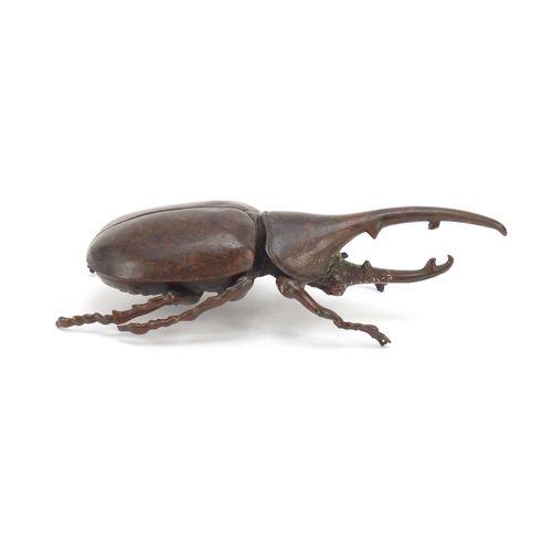 409 - Large Japanese patinated bronze Hercules beetle with articulated wings, 10cm in length